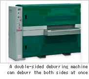A double-sided deburring machine can deburr the both sides at once